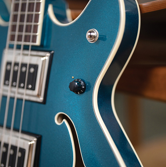 Close-up of the side neck of Starfire Deluxe Bass Teal the Deal thumb
