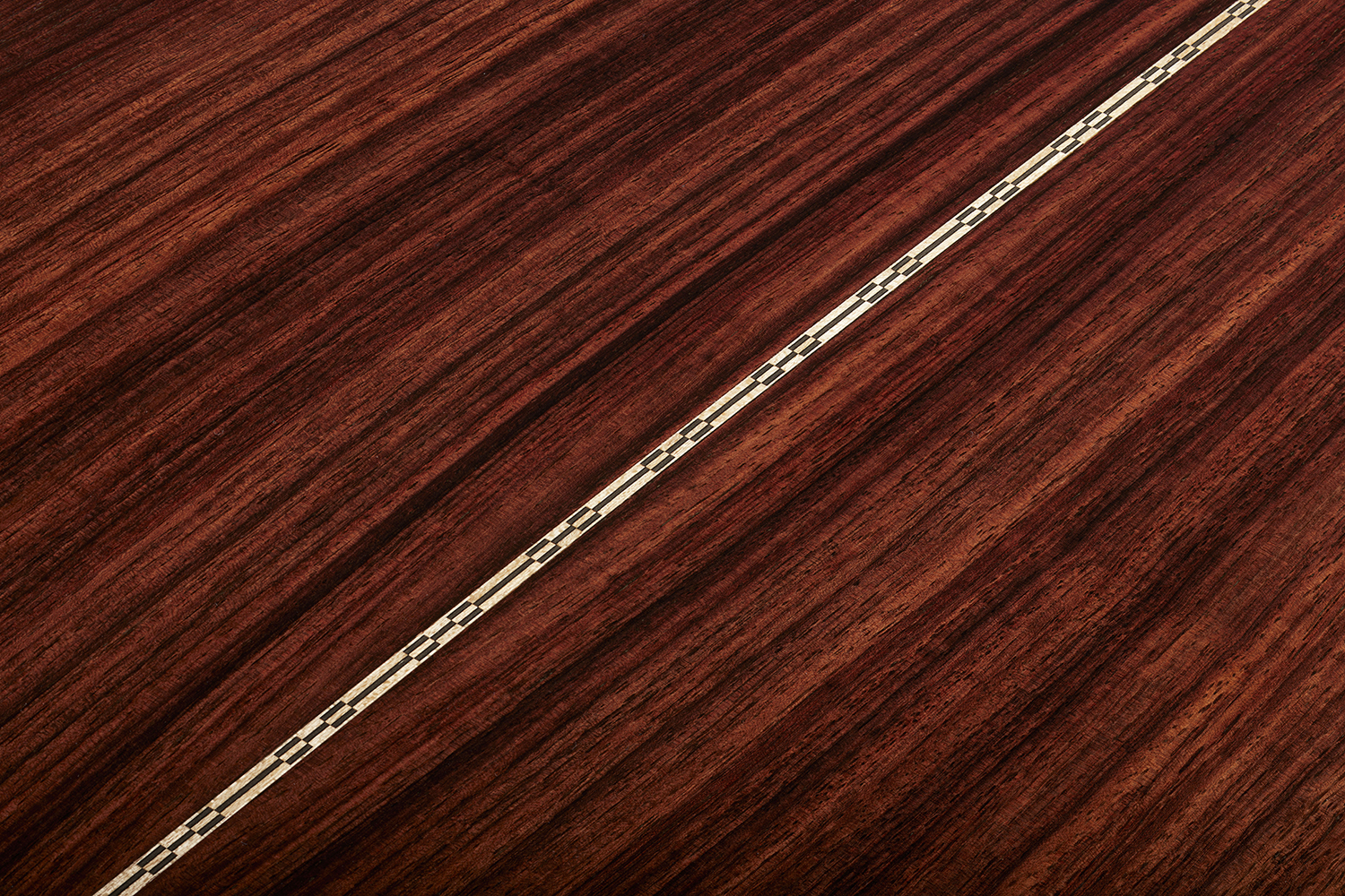 Close-up of F-512E Antique Burst showcasing the back wood grain and inlay.