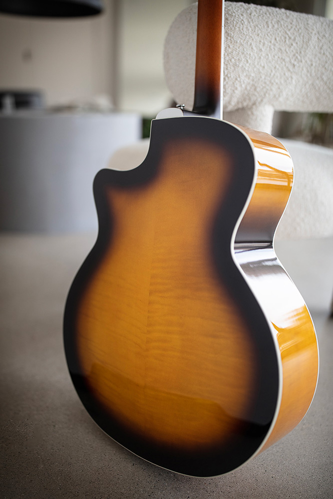 Close-up F-250CE Deluxe Archback Antique Burst arched flamed maple back