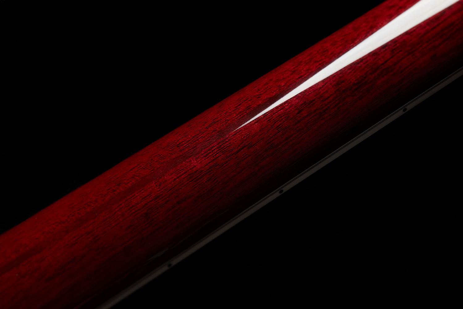 Close-up of F-512E back of guitar neck showcasing the polished wood grain