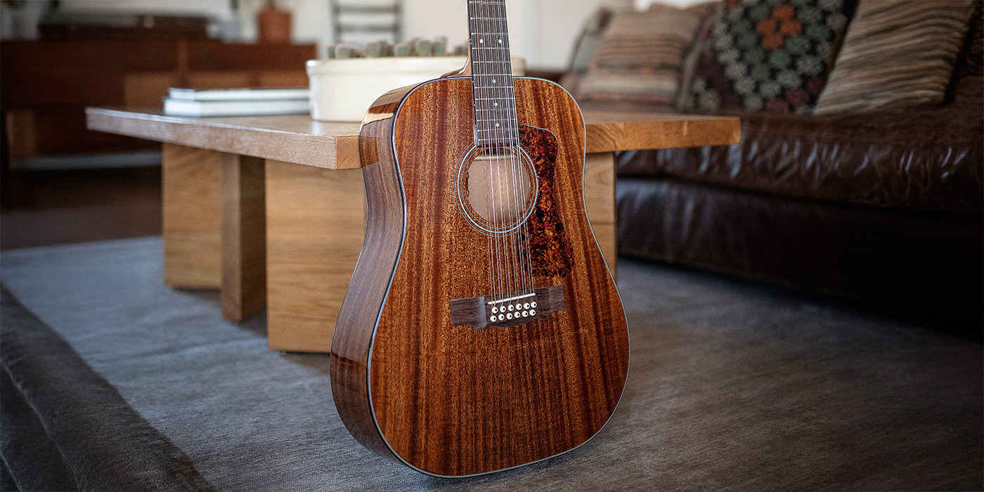 D-1212 leaning against a modern wood coffee table on a gray rug
