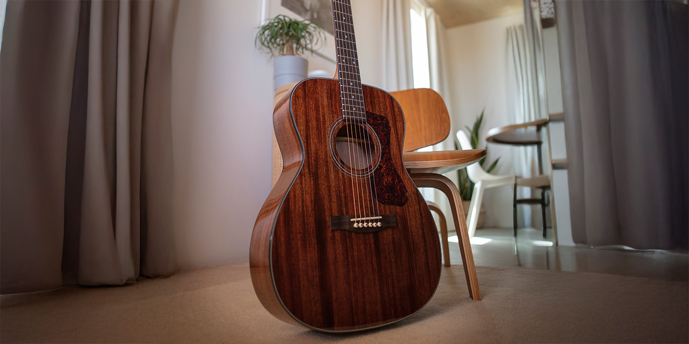 OM-120 Natural leaning against a modern wood chair in a cozy sitting room