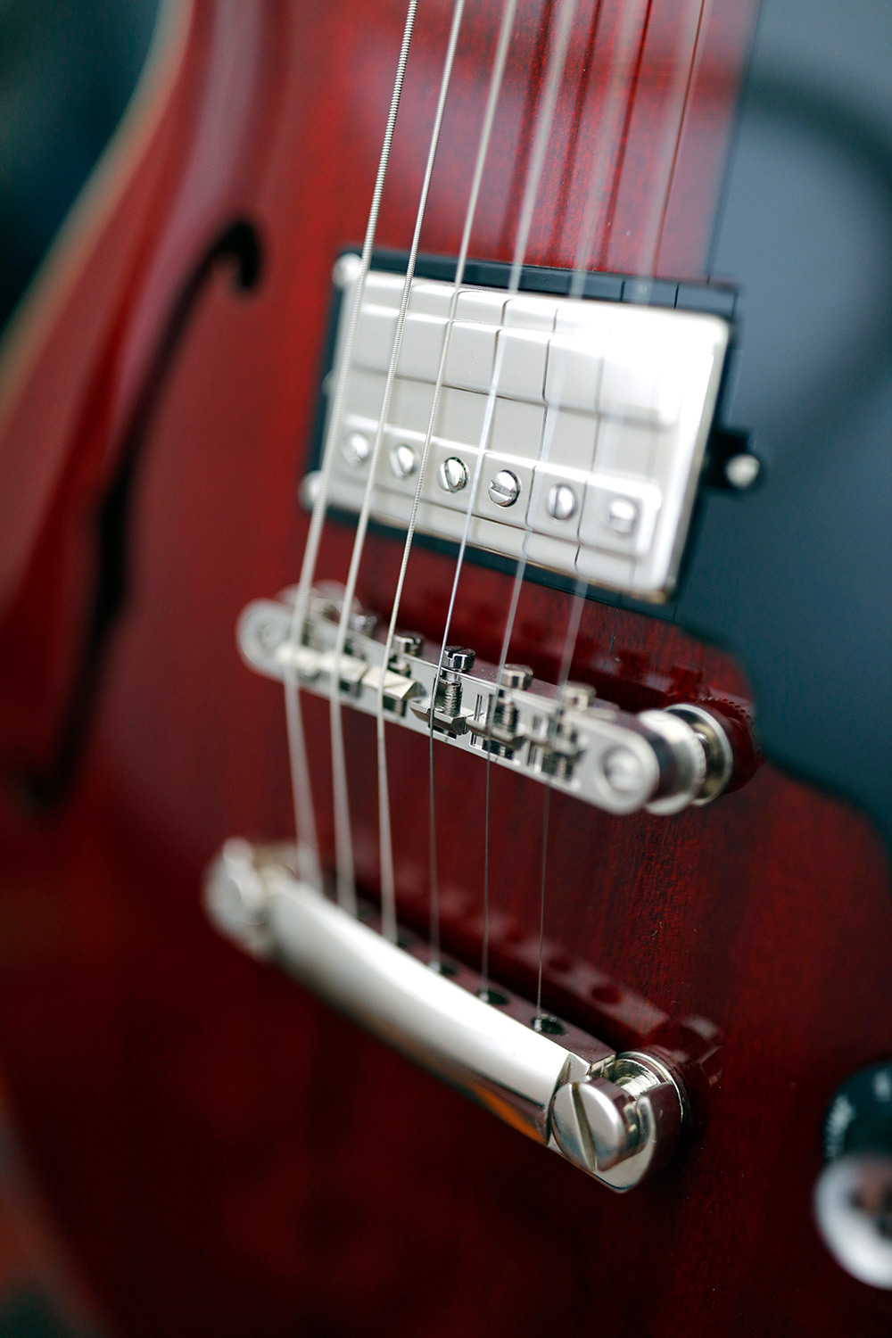 Starfire I DC Cherry red guitar close up of pickup and bridge