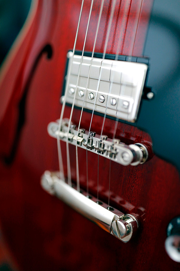 Thumbnail view of Starfire I DC Cherry red guitar close up of pickup and bridge
