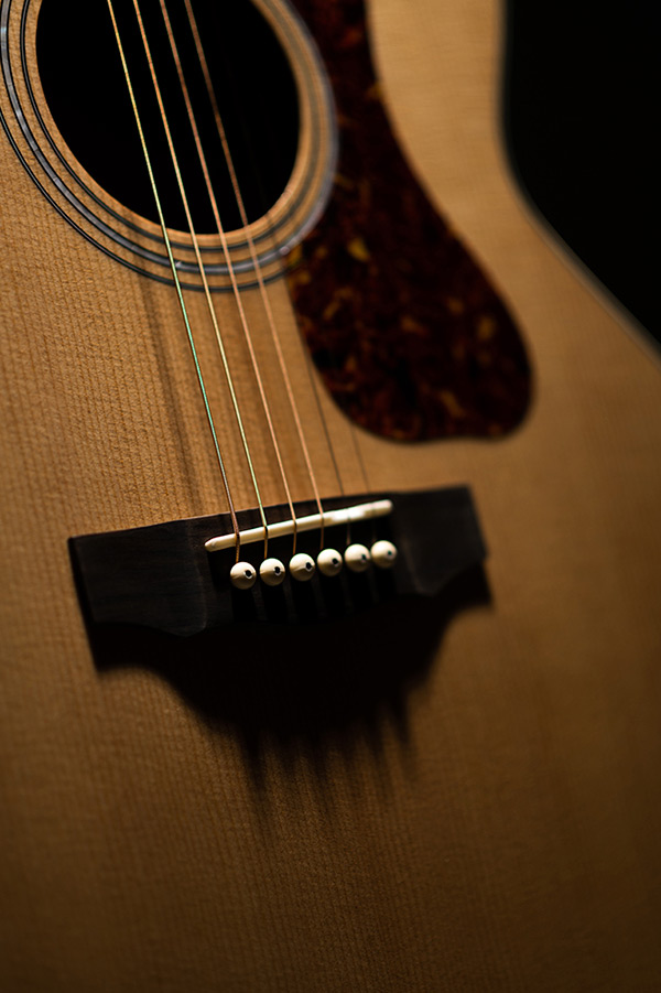 Close-up of F-240E Natural body showing bridge