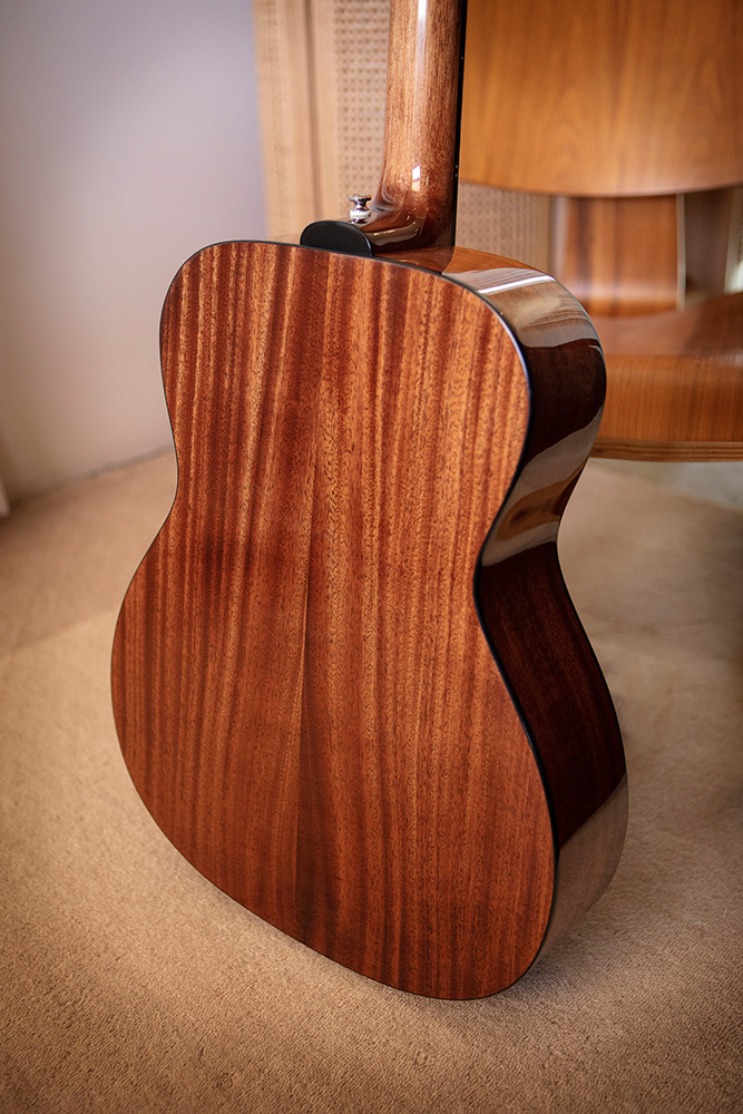 Close up of OM-120 back showcasing Solid African Mahogany