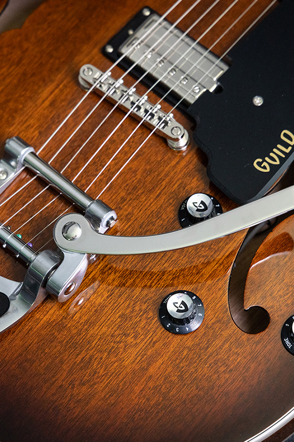 Thumbnail close-up view of Starfire I DC California Burst body highlighting the knobs and vibrato tailpiece