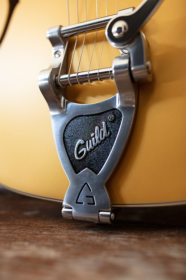Thumbnail close-up view of Starfire I Jet90 Satin Gold electric guitar vibrato tailpiece