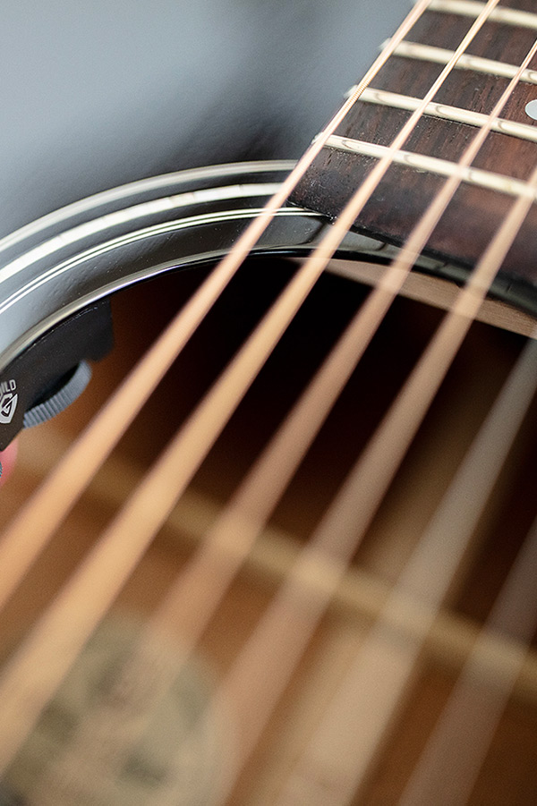 Close up of D-140CE Black soundhole with electronics thumbnail