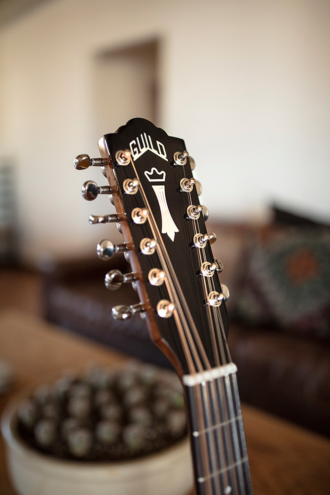 Close up of D-1212 headstock with Guild Peak logo