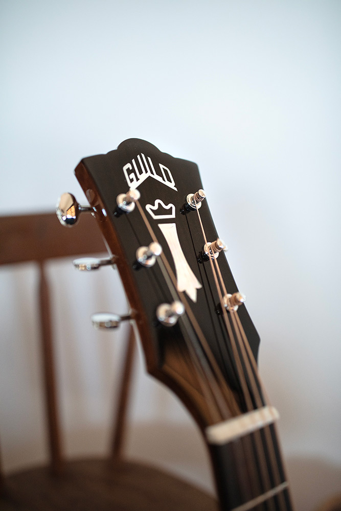 Close up M-120 headstock with Guild Peak logo