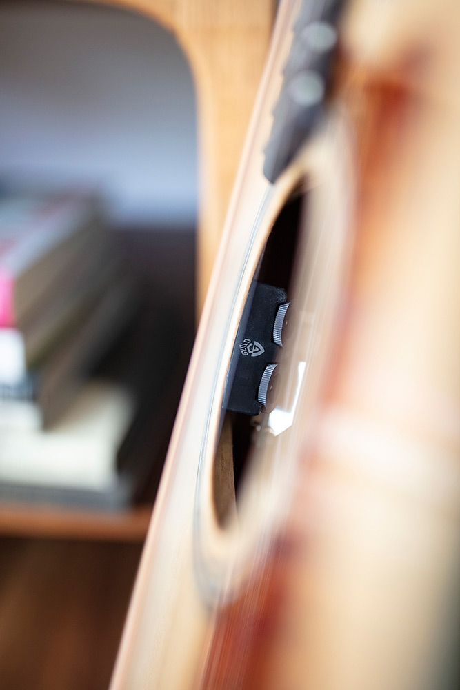 Close up of OM-150CE Natural electronics