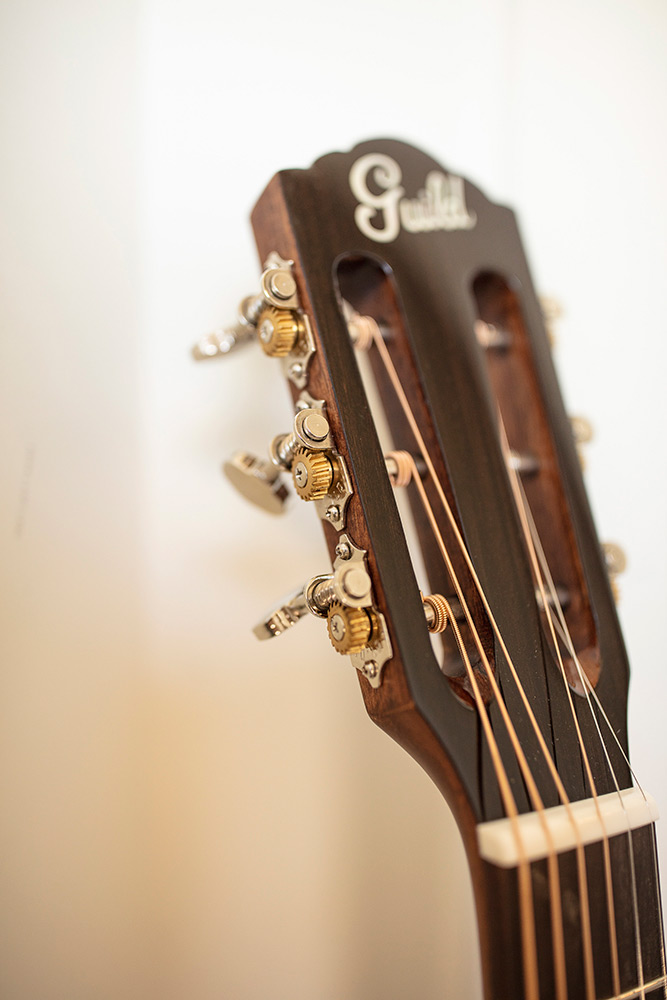 P-240 Memoir Natural close up of the headstock