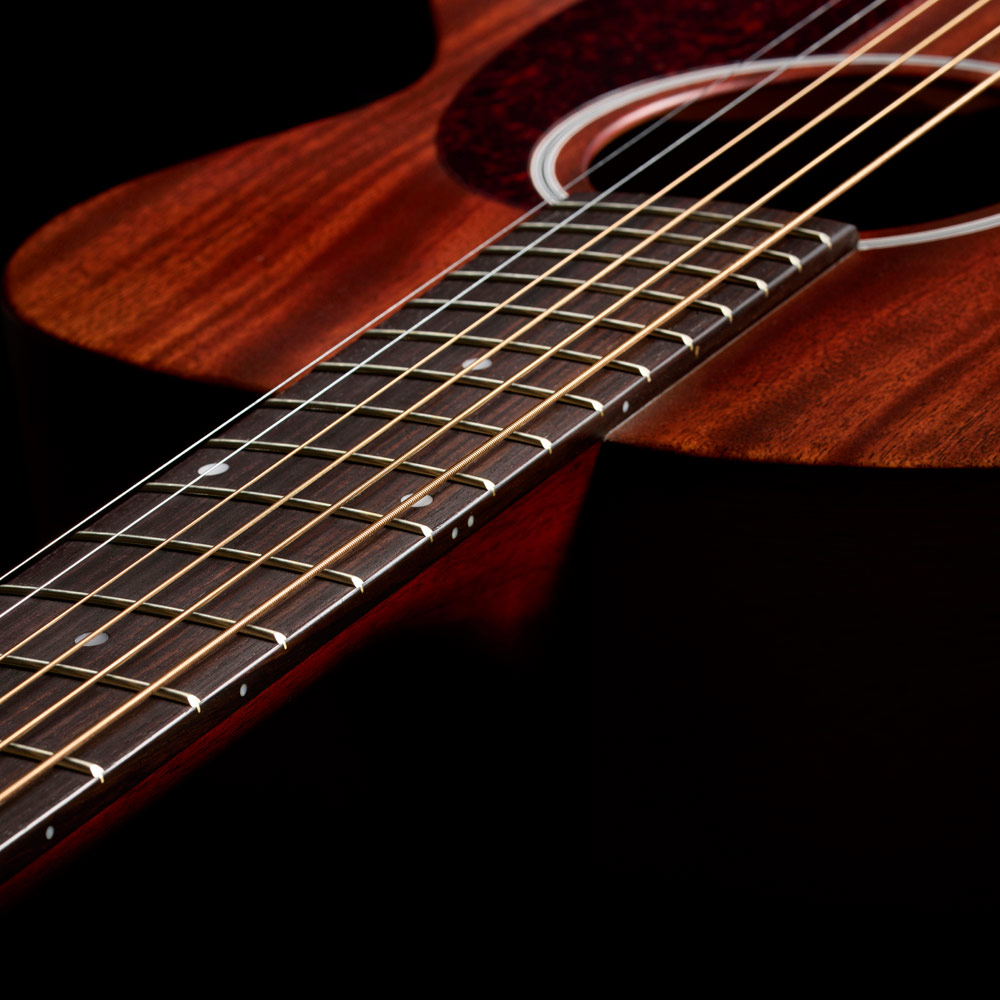 Close-up of M-20 Natural neck and strings thumb