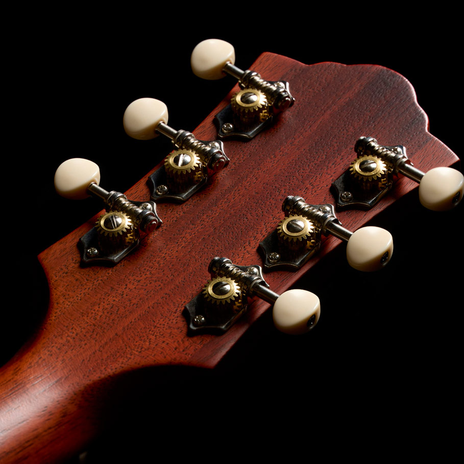 Close-up of the back of the M-20 Natural headstock thumb