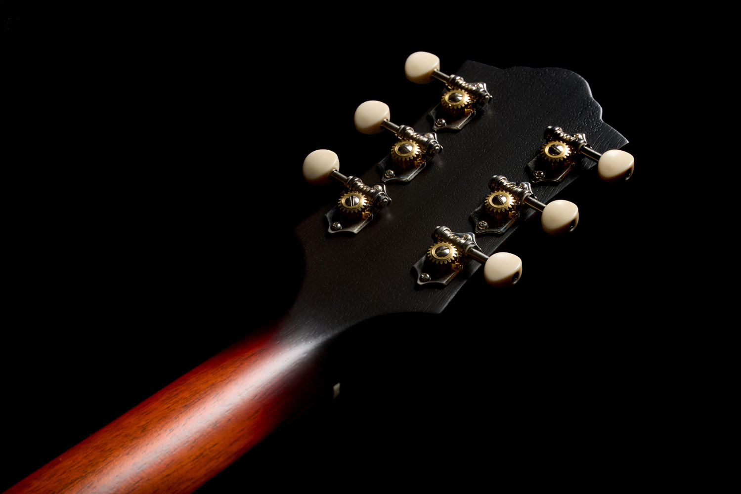 Close-up of the back of the M-20 Vintage Sunburst headstock