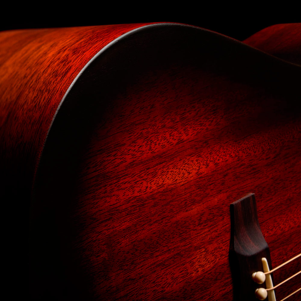Close-up of the back of the D-20 Vintage Sunburst bottom body curve thumb