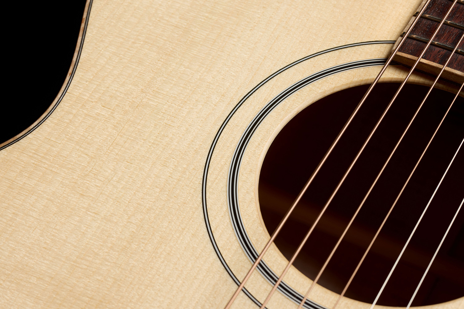 Close-up of VR1 F-40 Au Naturel body showcasing ultra-rare aged solid 5A Adirondack spruce top