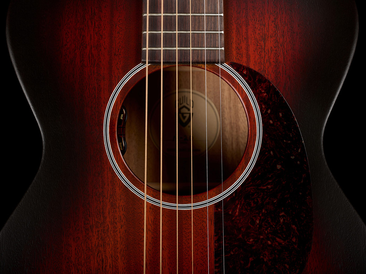 Close-up of M-20E Vintage Sunburst acoustic guitar soundhole showcasing L.R. Baggs Element VTC pickup system
