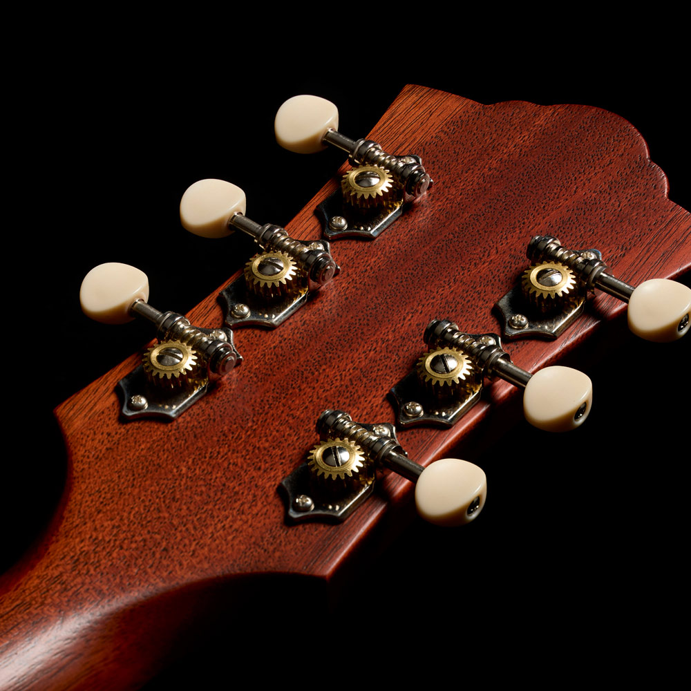 Close-up of the back of the D-20 Natural headstock thumb