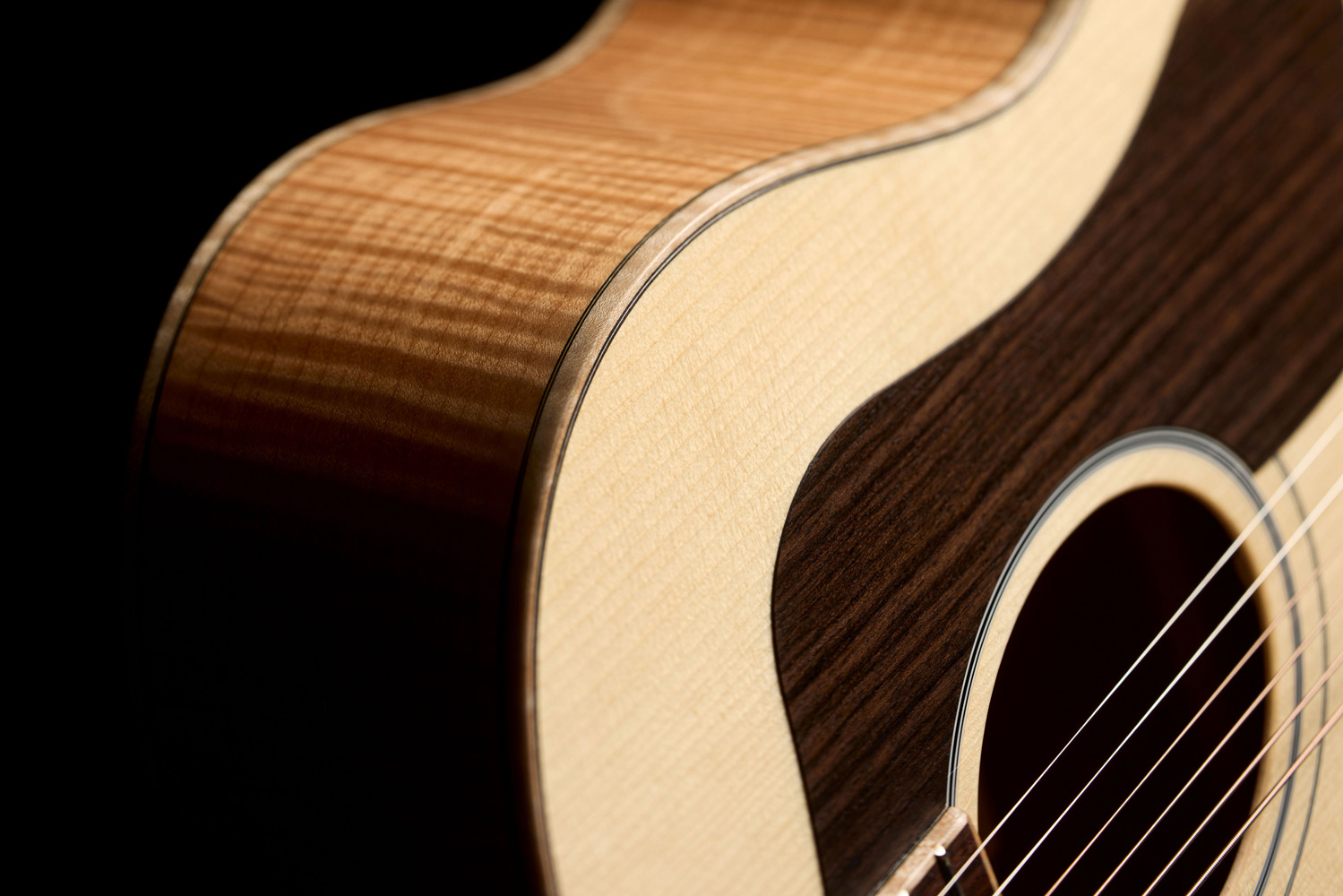 Close-up of VR1 F-40 Au Naturel shoulder showcasing ultra-rare aged solid 5A flame maple sides