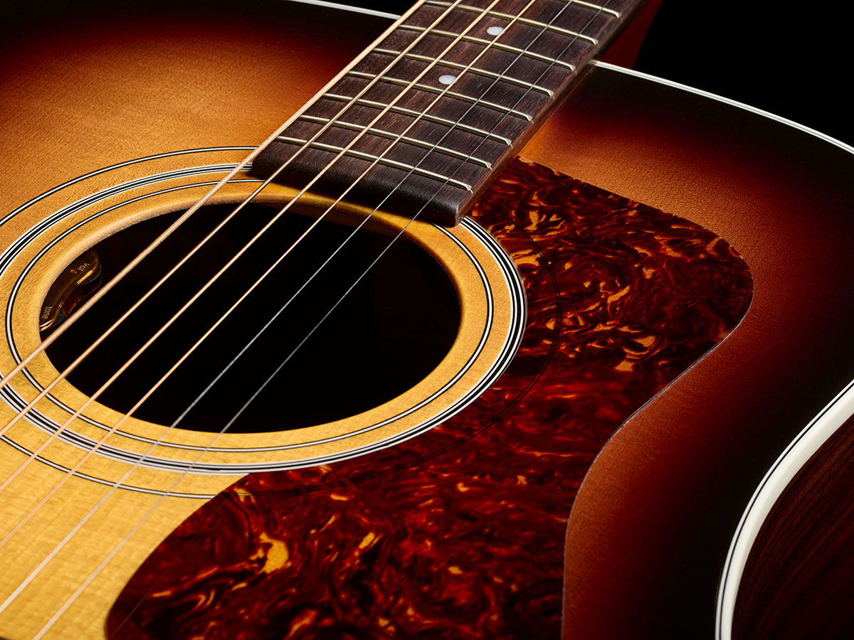 Close-up of D-50E Standard Antique Burst soundhole showcasing the L.R. Baggs Element VTC pickup system