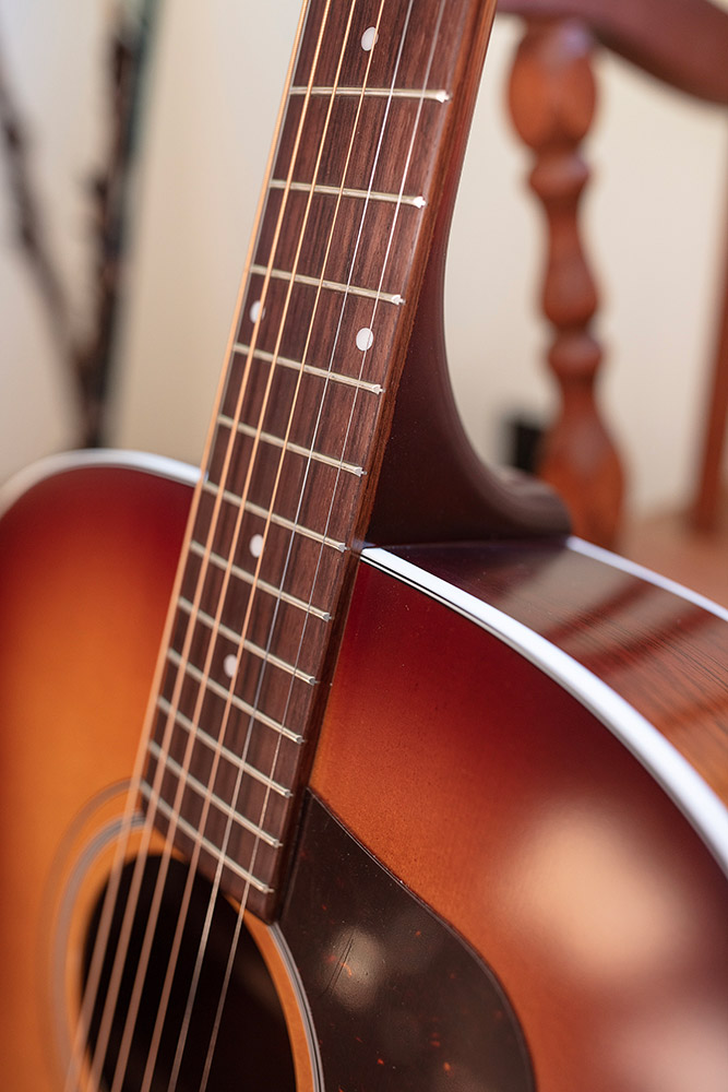 Close-up of F-40 Standard Pacific Sunset Burst neck and strings