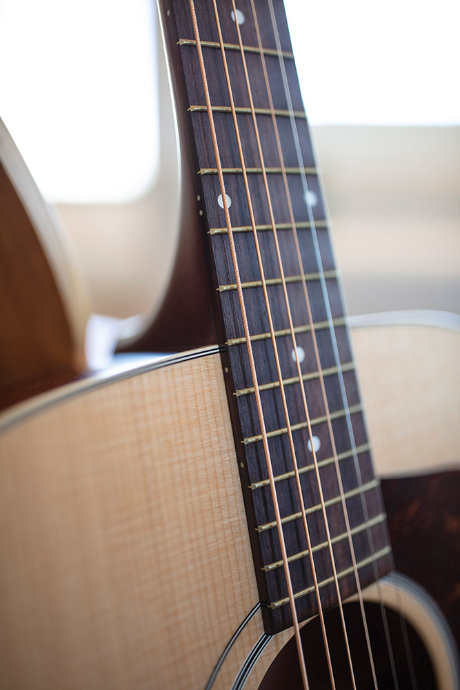 Close up view of D-40 Standard Natural neck and strings