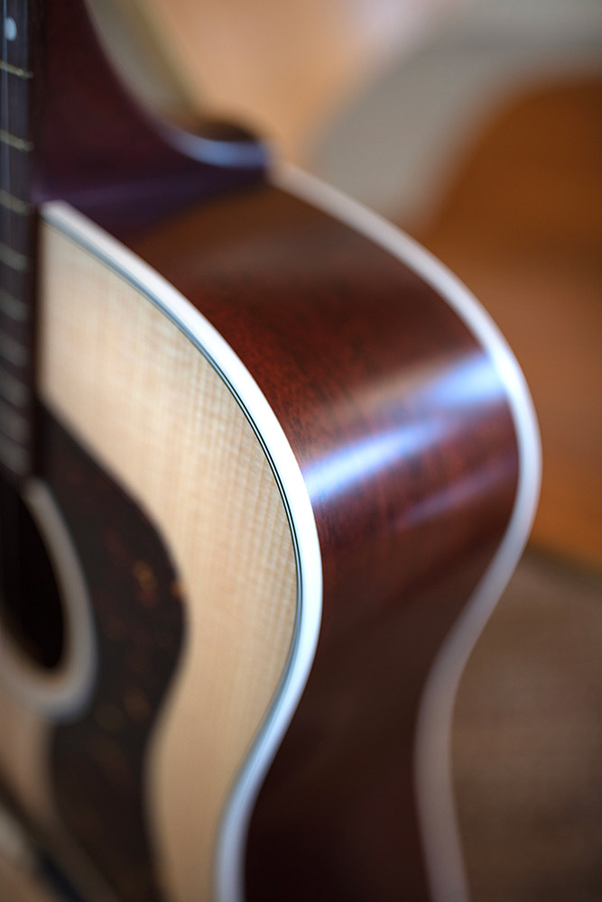 Close up of D-40 Standard Natural side highlighting solid African mahogany