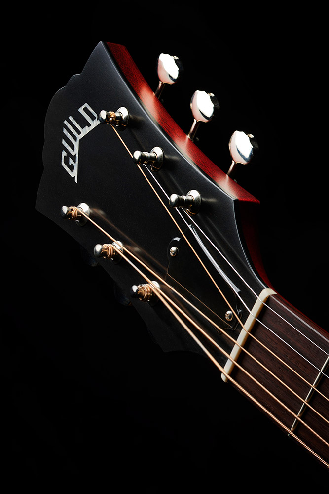Close-up D-50 Standard Natural headstock with Guild Peak logo