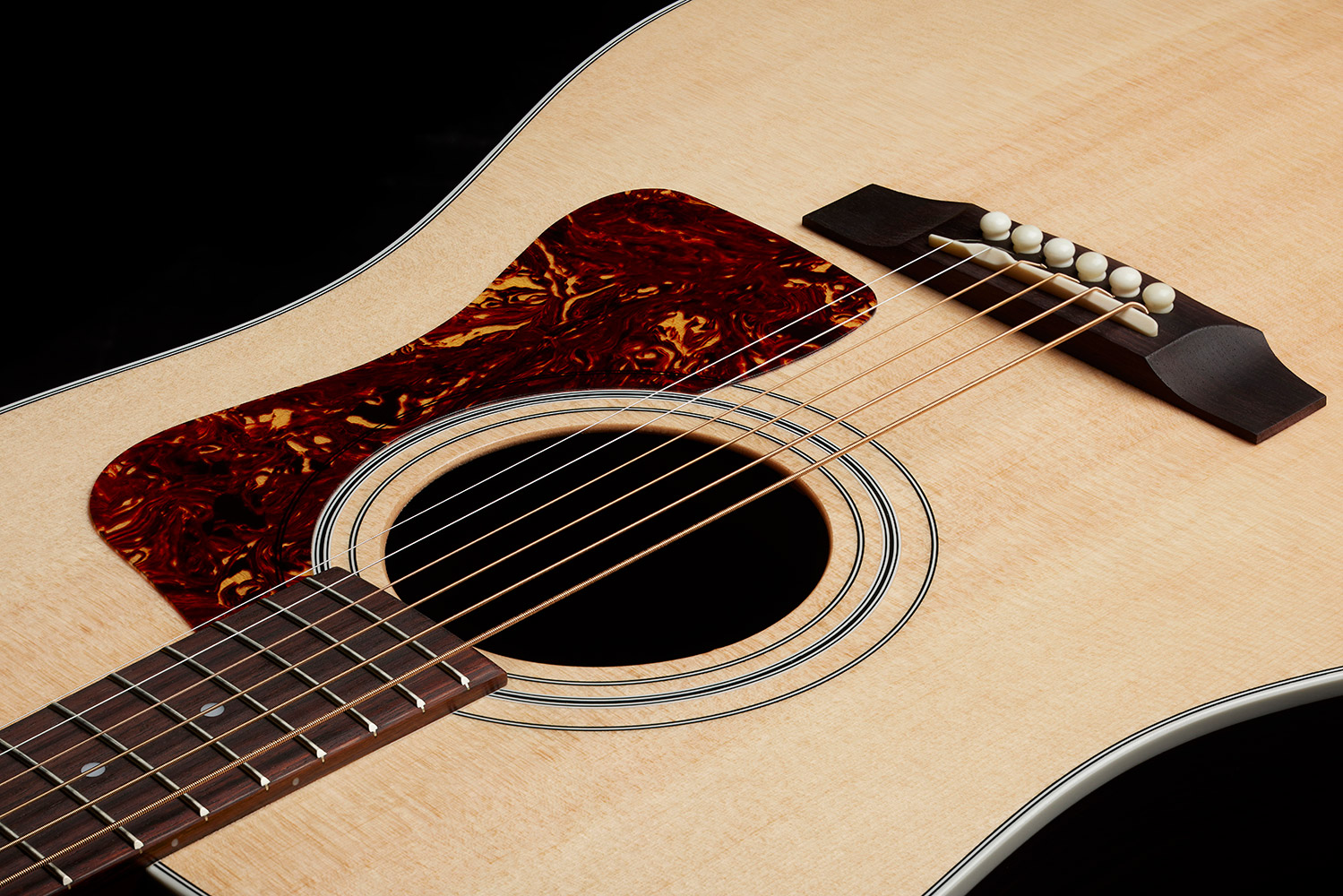 Top down view of D-50 Standard Natural pickguard and soundhole