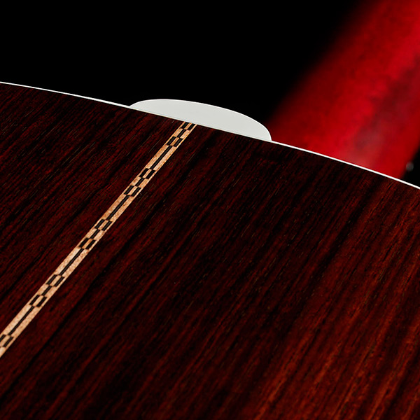 Close-up of back of the M-50 Standard Antique Burst heel thumb