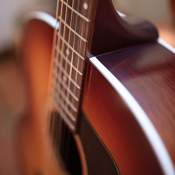 Close-up of F-40 Standard Pacific Sunset Burst body binding thumb