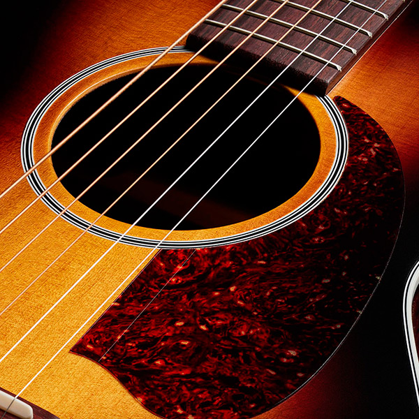 Close-up of M-50 Standard Antique Burst soundhole thumb