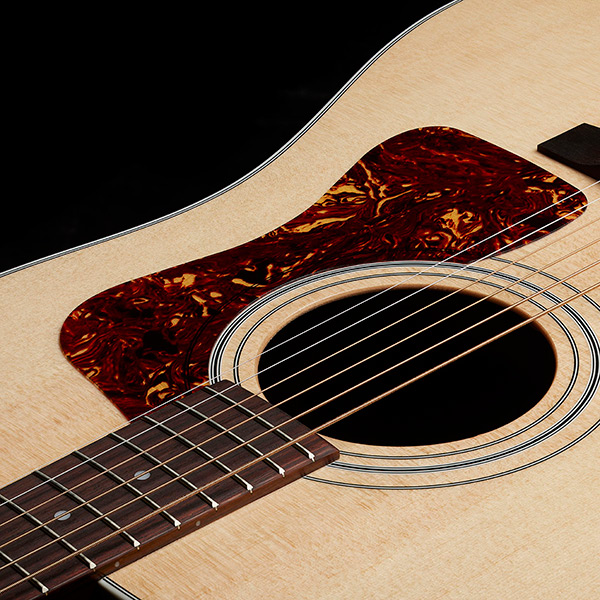 Top down view of D-50 Standard Natural pickguard and soundhole thumb