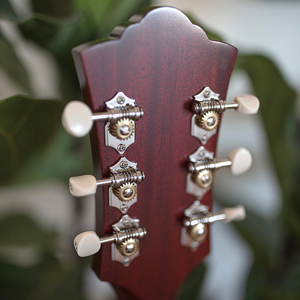 Close-up of the back of the D-50 Standard Antique Burst headstock thumb