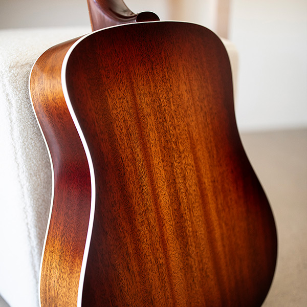 Back view of D-40 Standard Pacific Sunset Burst body showcasing the solid African mahogany thumb