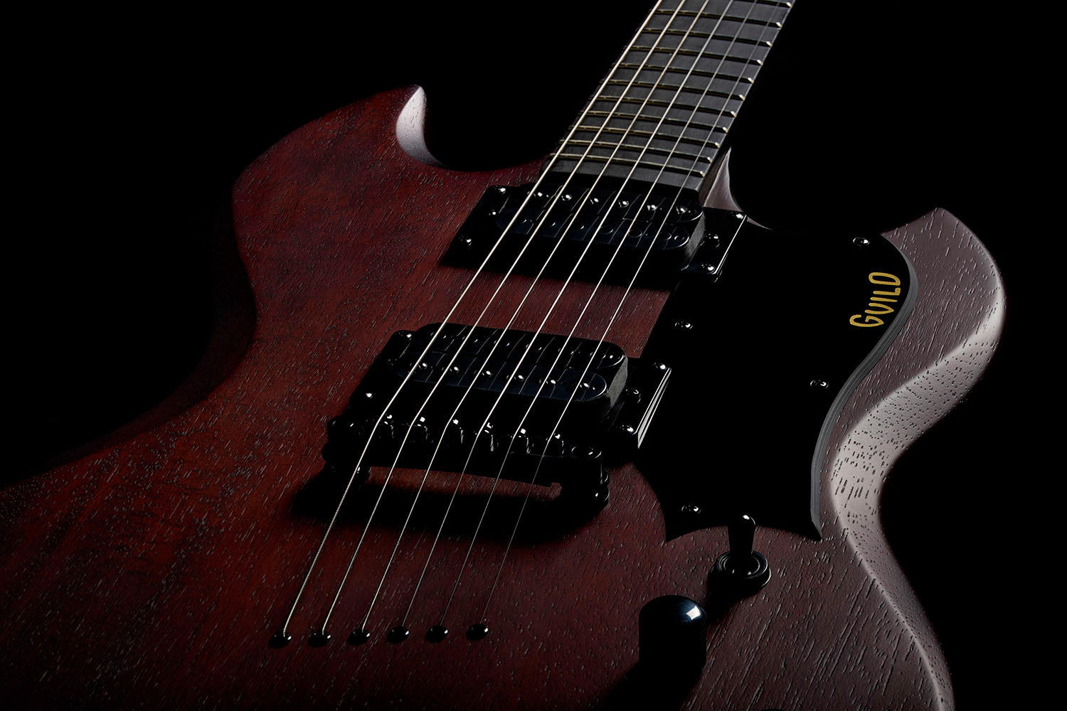 Close-up of Polara Limited Night Edition Vintage Walnut body
