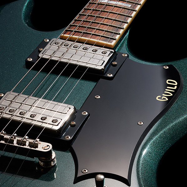 Close-up of back of the Polara Deluxe Kingswood Green pick guard with Giuld logo thumb