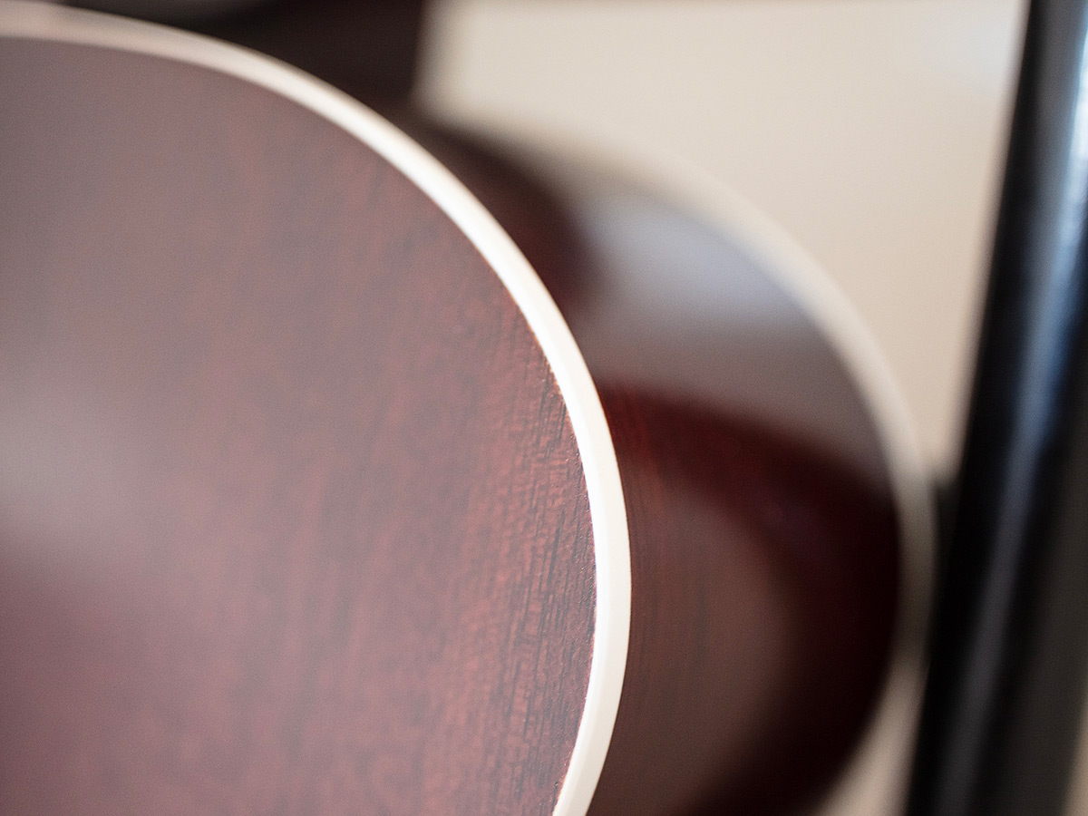 Close-up of F-40 Standard Natural shoulder highlighting solid African mahogany back and sides