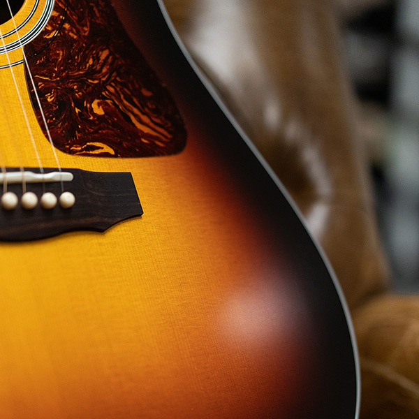 Close-up of D-50 Standard Antique Burst bottom curve thumb