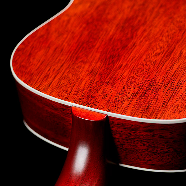 Close-up of M-40 Standard Natural heel showcasing solid African mahogany back and sides thumb