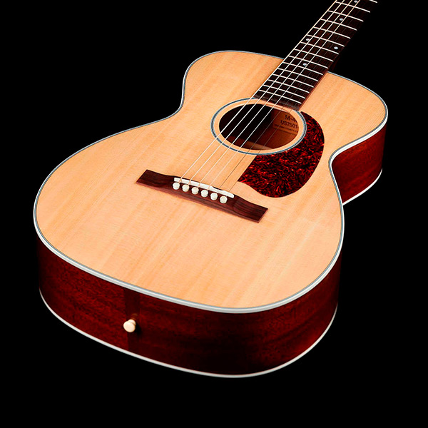 View of M-40 Standard Natural body showcasing solid Sitka spruce top thumb