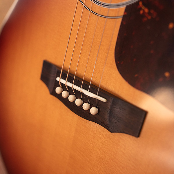 Close-up of F-40 Standard Pacific Sunset Burst bridge thumb