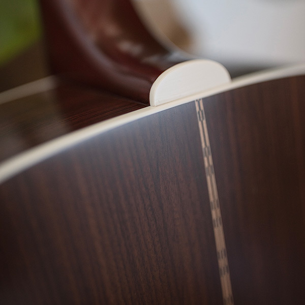 Close-up of D-50 Standard Antique Burst heel thumb