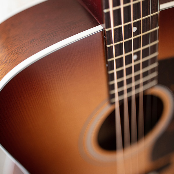 Top down view of D-40 Standard Pacific Sunset Burst neck and body thumb