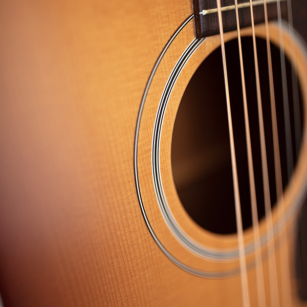 Close-up of D-40 Standard Pacific Sunset Burst soundhole thumb