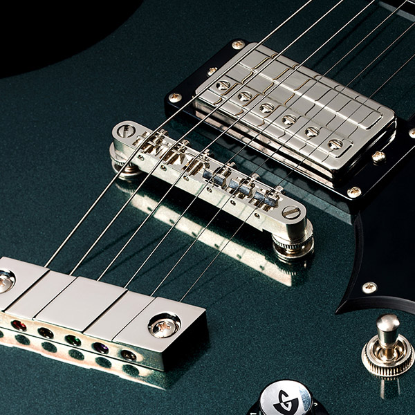 Close-up of front of the Polara Deluxe Kingswood Green saddle and pickups thumb