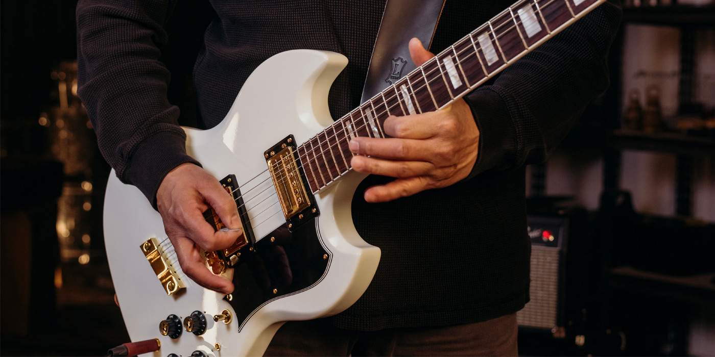 Close up of USA Artist Edition S-100 Polara Kim Thayil body and strings with Kim Thayil playing