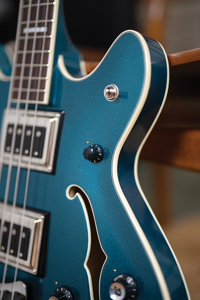Close-up of the side neck of Starfire Deluxe Bass Teal the Deal